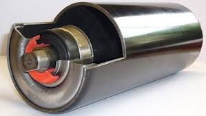 A machined conveyor drum pulley with its shaft through the centre and a locking element at the end. A machined conveyor drum pulley with its shaft through the centre and a locking element at the end.