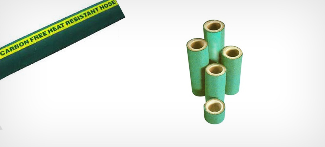 A carbon free heat resistant hose beside the green ceramic couplings it is fitted with. A carbon free heat resistant hose beside the green ceramic couplings it is fitted with.