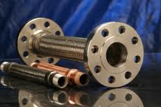 Two steel corrugated hose assemblies, one ending in a drilled flange and one in a threaded fitting. Two steel corrugated hose assemblies, one ending in a drilled flange and one in a threaded fitting.