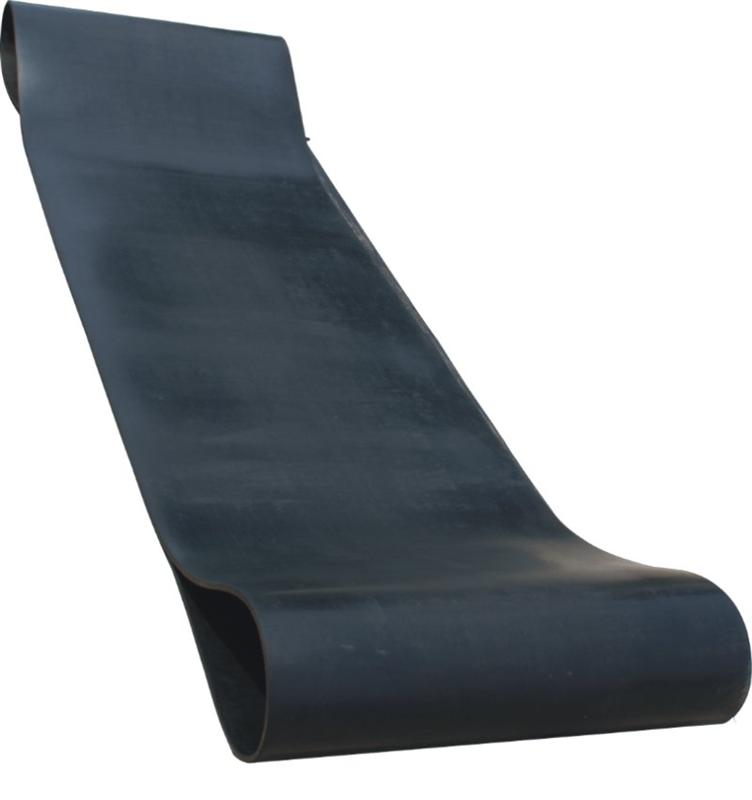 A length of endless hot vulcanised belting for shot blasting, curved over to show its smooth cover. A length of endless hot vulcanised belting for shot blasting, curved over to show its smooth cover.