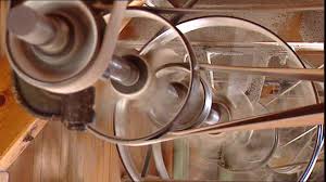 Flat belts driving the rollers of a flour mill.