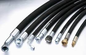 A fan of hydraulic hose assemblies in several bores, each swaged to its own end fitting. A fan of hydraulic hose assemblies in several bores, each swaged to its own end fitting.