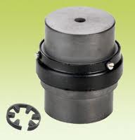 A snap wrap coupling standing on end, with the split element that wraps around it lying alongside. A snap wrap coupling standing on end, with the split element that wraps around it lying alongside.