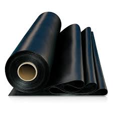 Rolls of synthetic rubber sheeting, one standing on its core and one folded over in front.