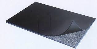A sheet of insertion ply rubber with one corner turned back to show the fabric inside.