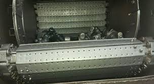The inside of a shot blasting machine, its drum lined with rubber sheet.