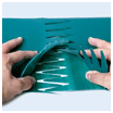 Two hands fitting the interlocking Z shaped fingers of a belt joint together.